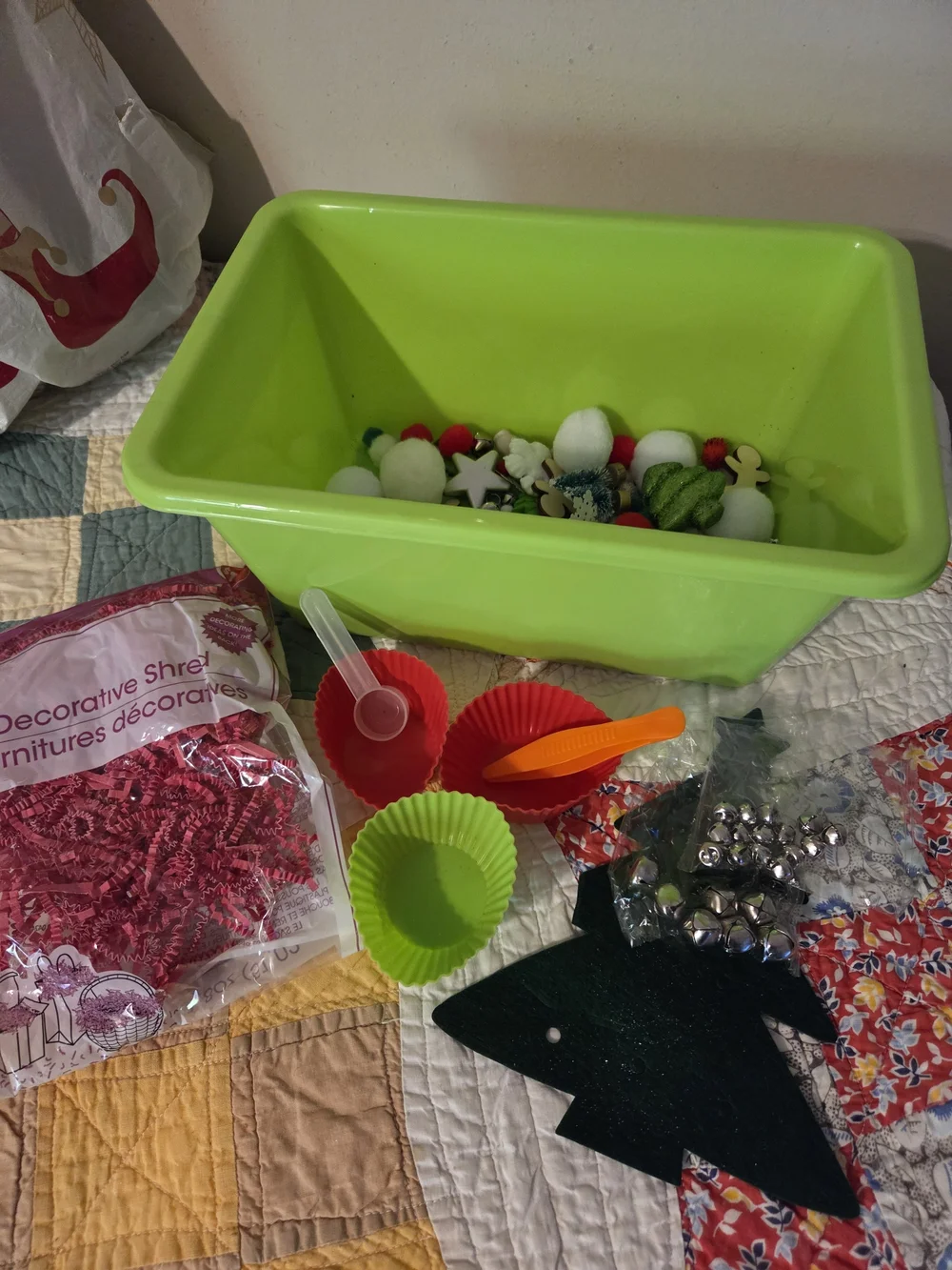 Fun bad of crinkle red paper & Christmas themed sensory bin add ins No Bin Inclu